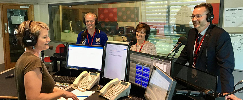 Volunteering WA staff at a radio broadcasting studio